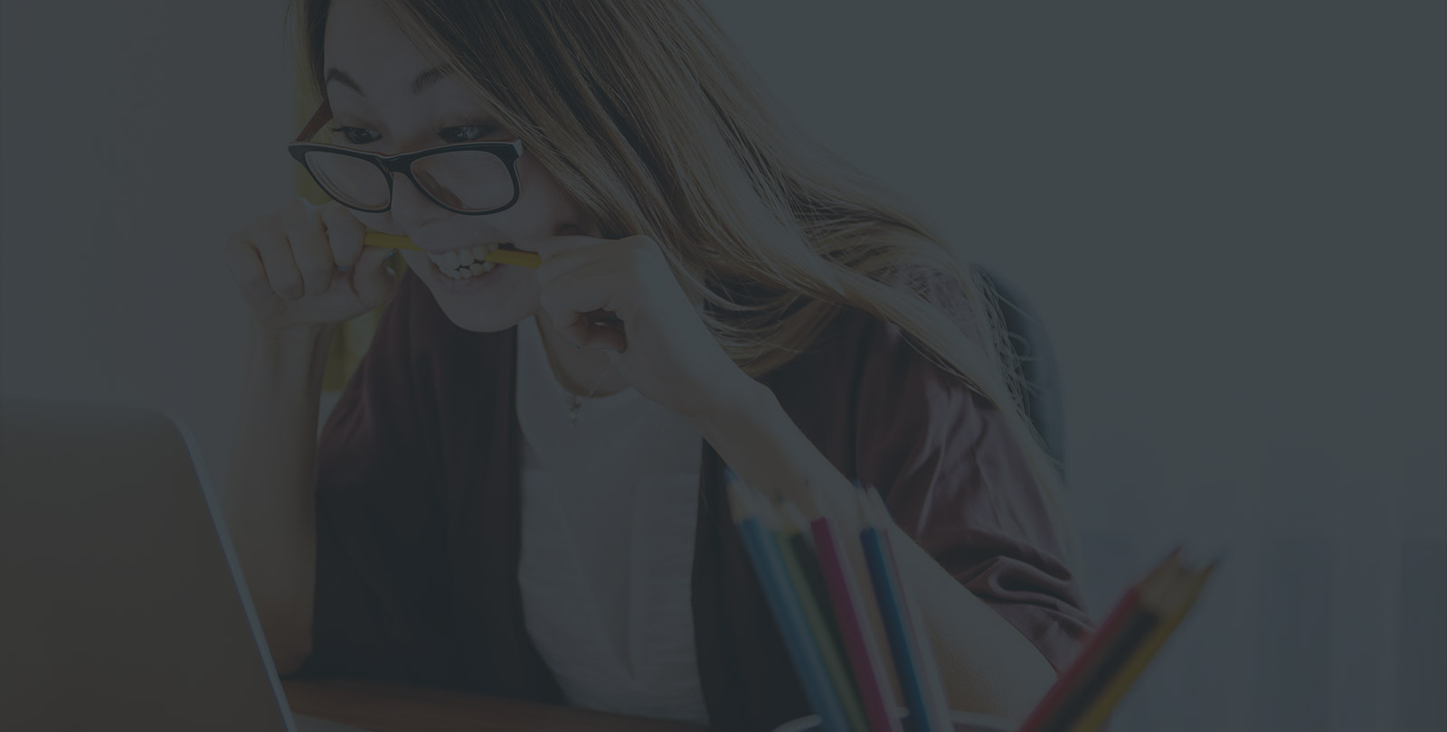 University campus with trees and buildings in sunset lighting, wide view